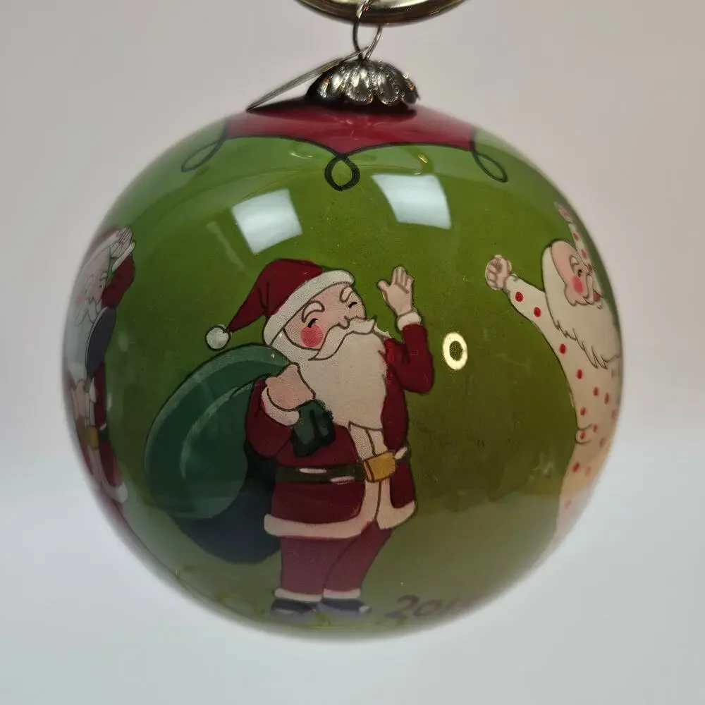 Pier One Li Bien reverse painted glass ornament Santa dressing green ball round